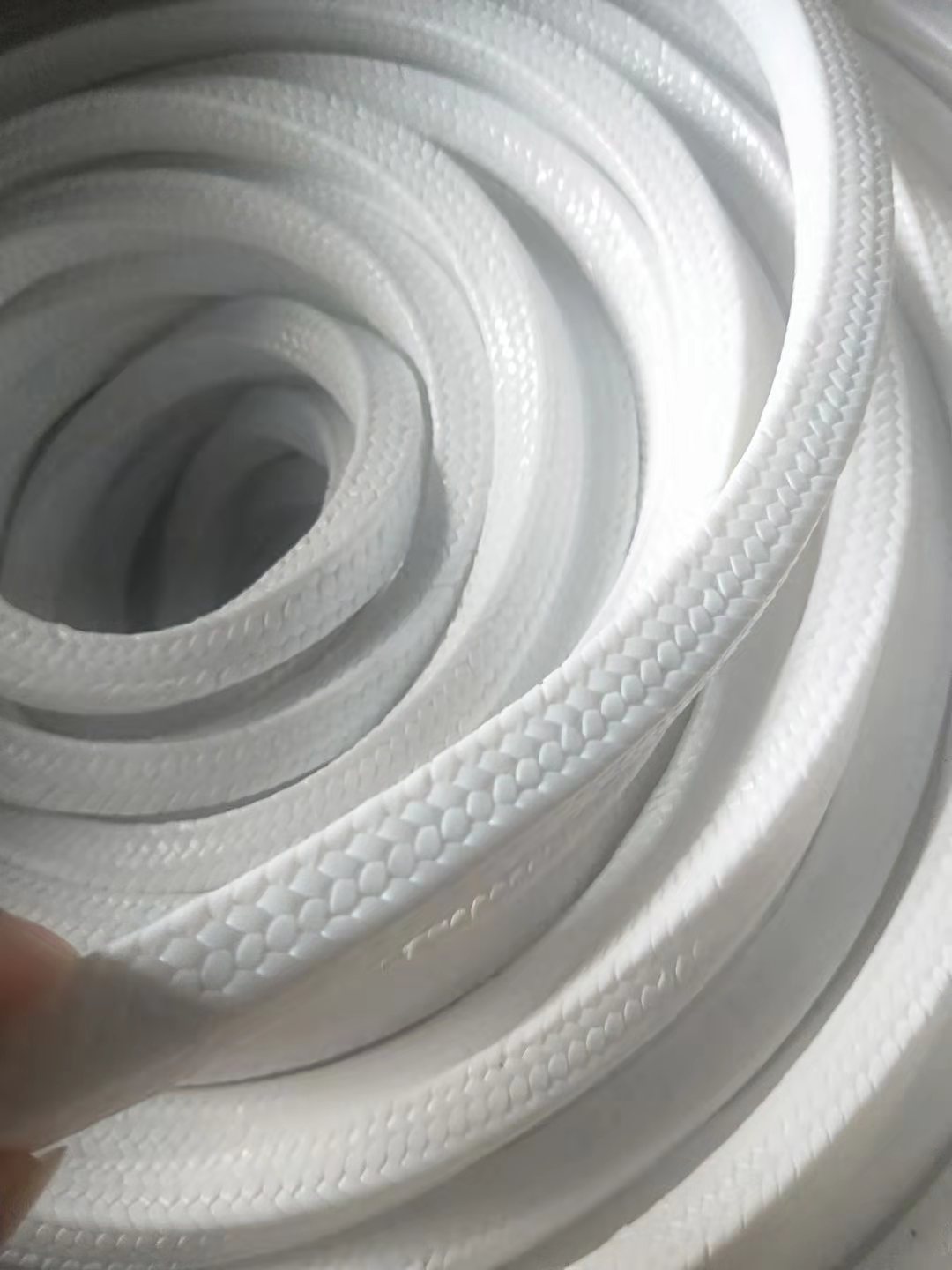 PTFE gland packing with oil